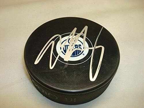 Адам Кленденинг подписа хокей шайба Едмънтън Ойлърс с автограф 1А - за Миене на НХЛ с автограф